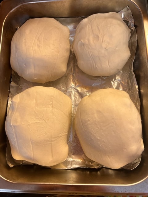 stuffed pastry mushrooms nestled in a tin