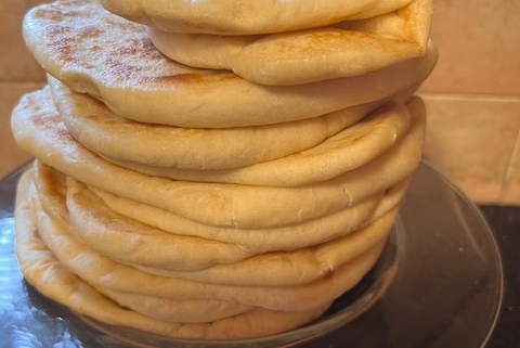 stack of flatbreads - top one is folded