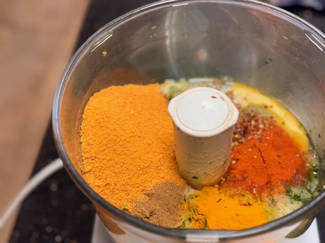 adding spices to fish