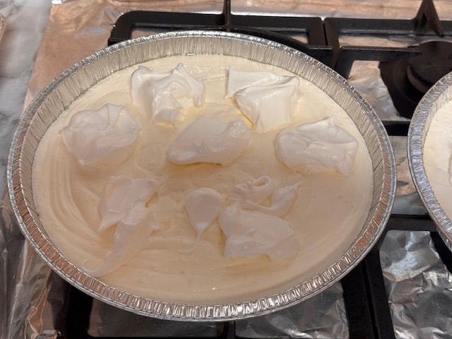 dollop meringue onto lemon mixture