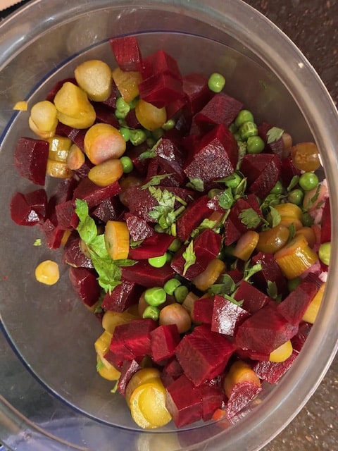 Add the beets and pickles to the bowl.