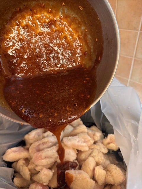 Pour sauce on chicken