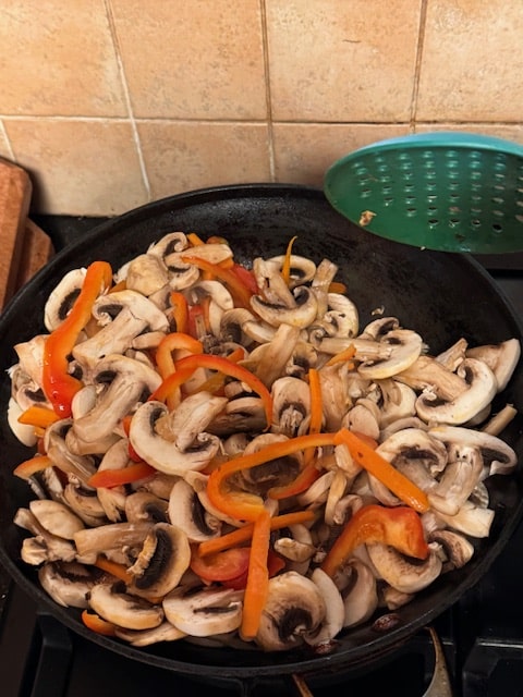 adding the mushrooms