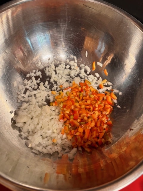 chopped onion and pepper in a bowl