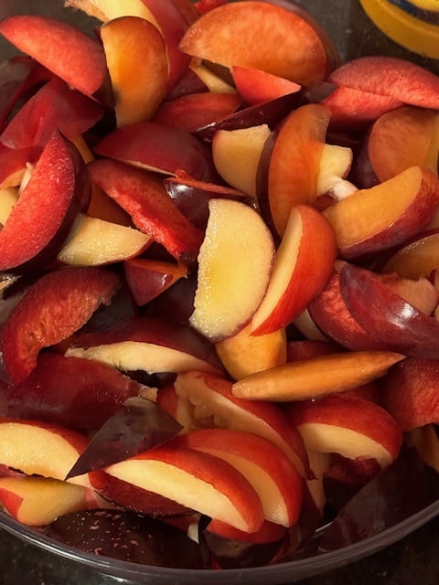 sliced peaches, nectarines and plums