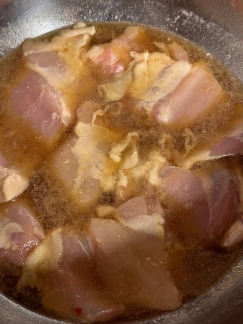 submerge the boneless, skinless thighs in mixture