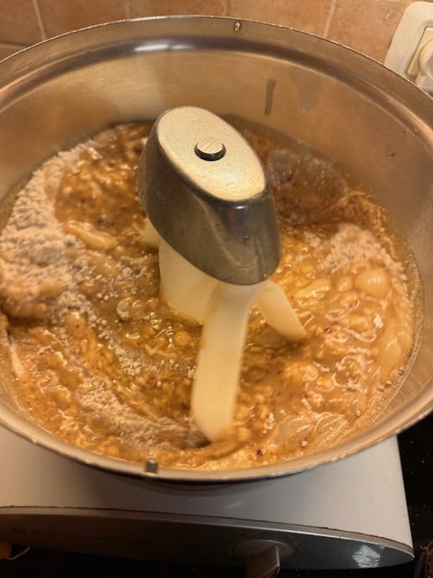 Add date mixture to dry mixture