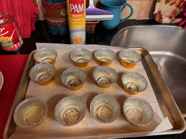 Oil the tins and get them ready