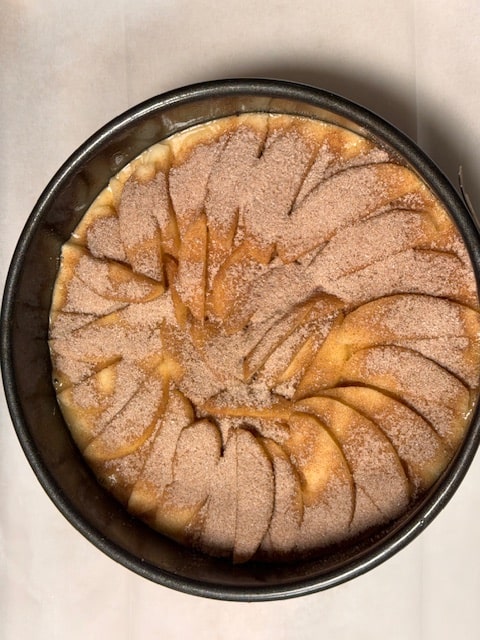 cinnamon sugar topping over top of apples