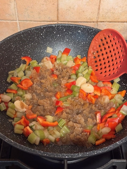 sauteeing the veggies