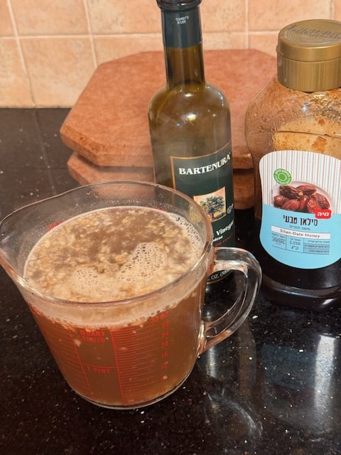 adding the liquids to the sauce