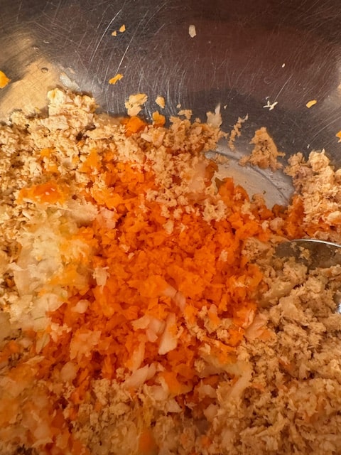 start by grinding/finely chopping the carrot and onion