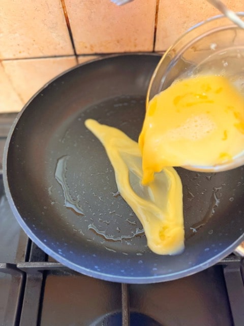 pour eggs into pan