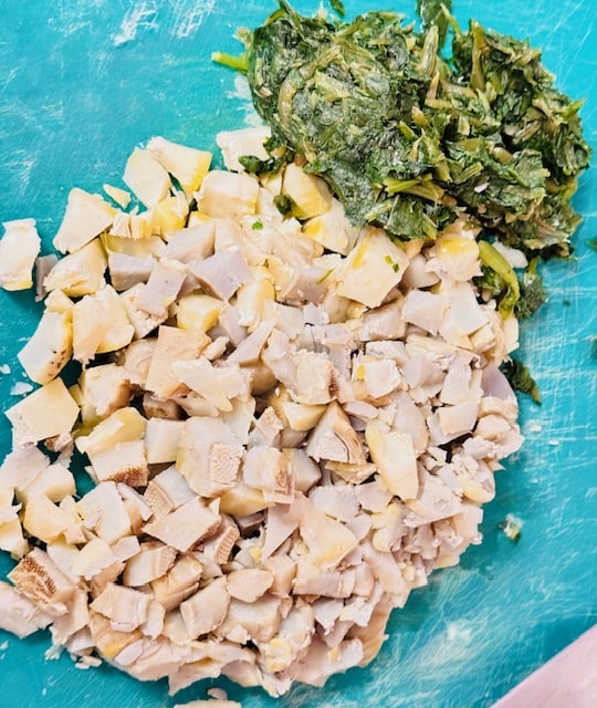 squeezed out spinach and zapped chopped artichoke hearts