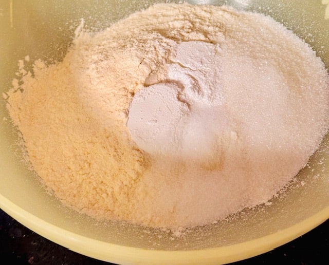 flour, sugar, baking powder and salt in a bowl