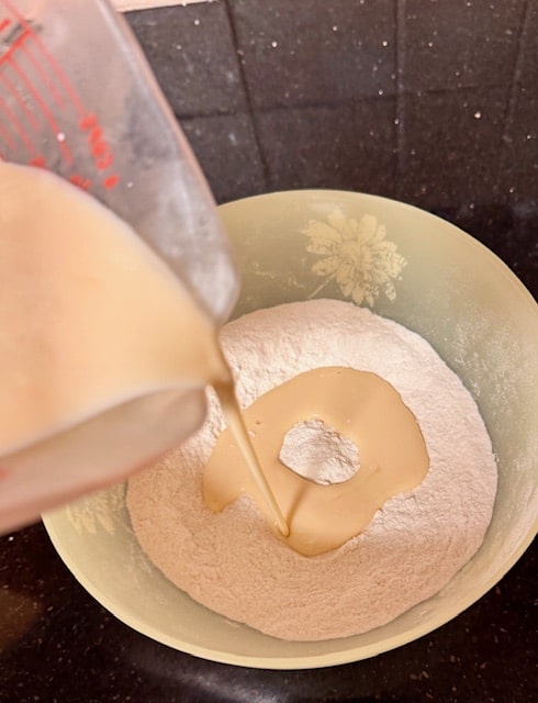 pour egg mixture into flour mixture