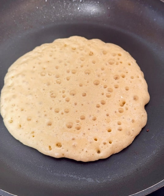 top of pancake is bubbly