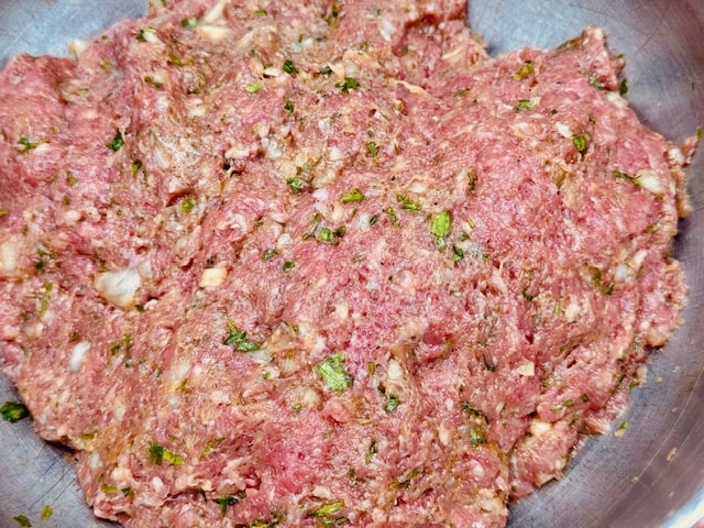 chopped meat and herb mixture combined