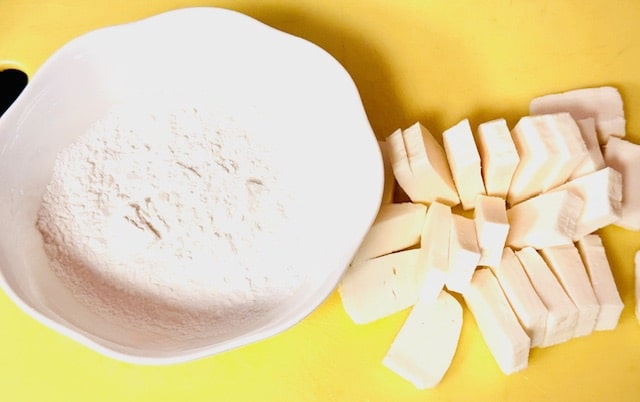 halloumi next to cornstarch with pinch of salt