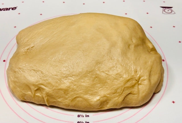 turn dough onto oiled mat
