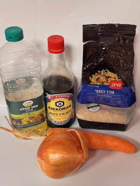 soy sauce, oil, rice, onion and carrot