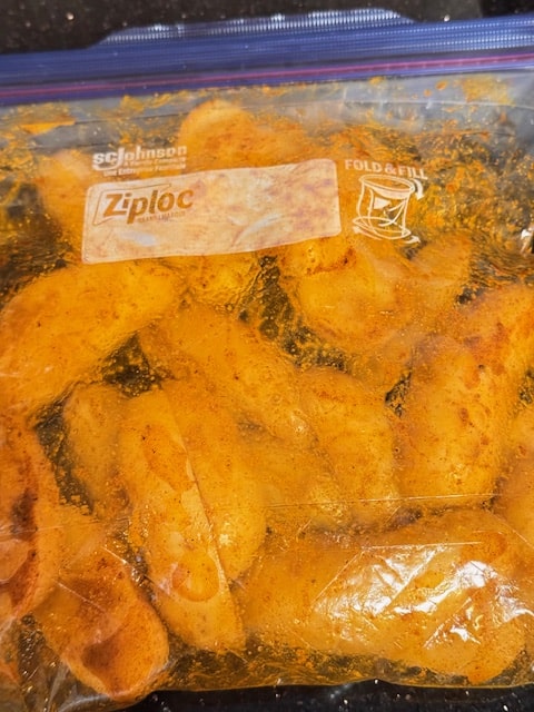 potatoes coated with oil and spices