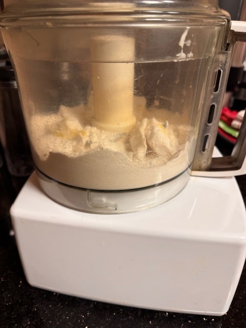 place crust ingredients in processor