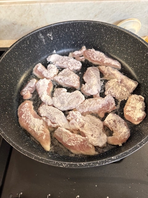shallow frying the chicken