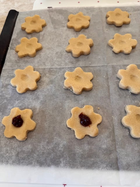 Place cookies on parchment lined sheets