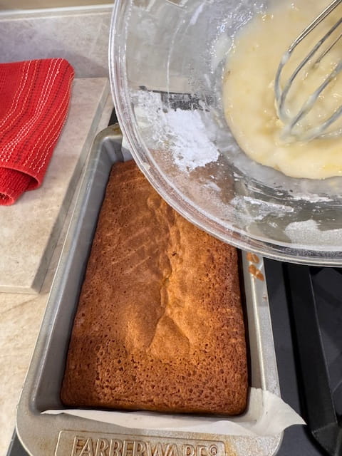 pouring out the thick icing