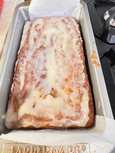 fully coated.  Some sinks into cake, the rest forms icing on top