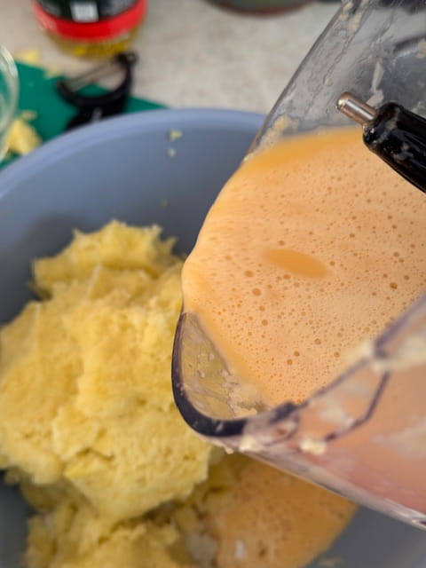 add egg-oil mixture to potato-onion mixture