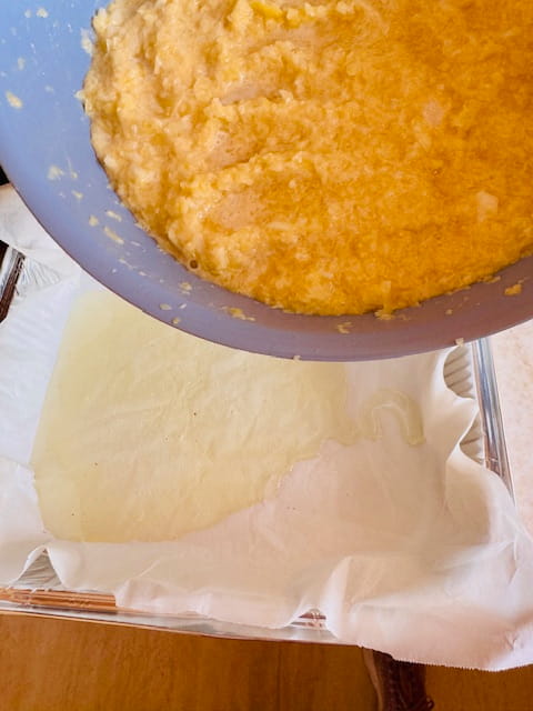 pouring potato mixture into hot oil - carefully!