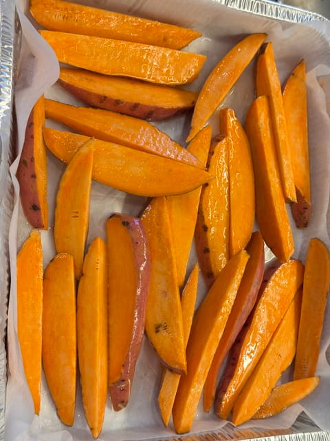 toss wedges with oil and salt