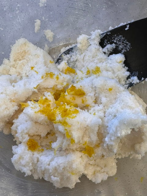 add self rising flour (or flour, baking powder and salt), cinnamon and lemon peel