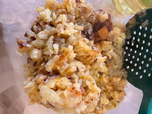toss the cooked potatoes and caramelized apples together