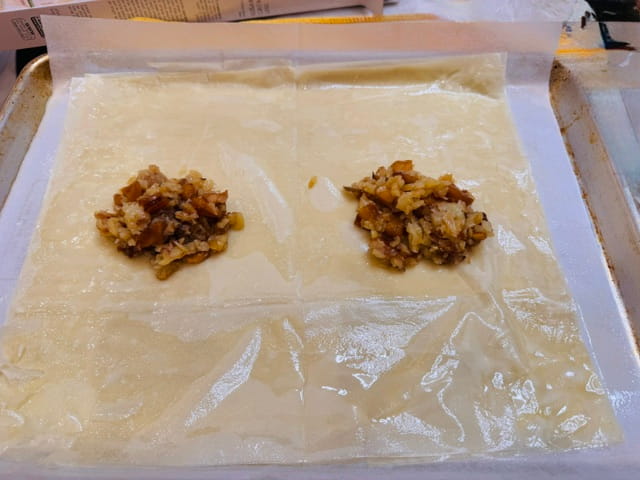 place mound of filling in the middle of oiled phyllo sheets
