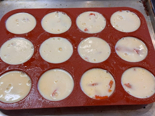 top cheese and peppers with egg mixture