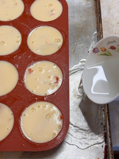 pour hot water on bottom of rimmed baking sheet